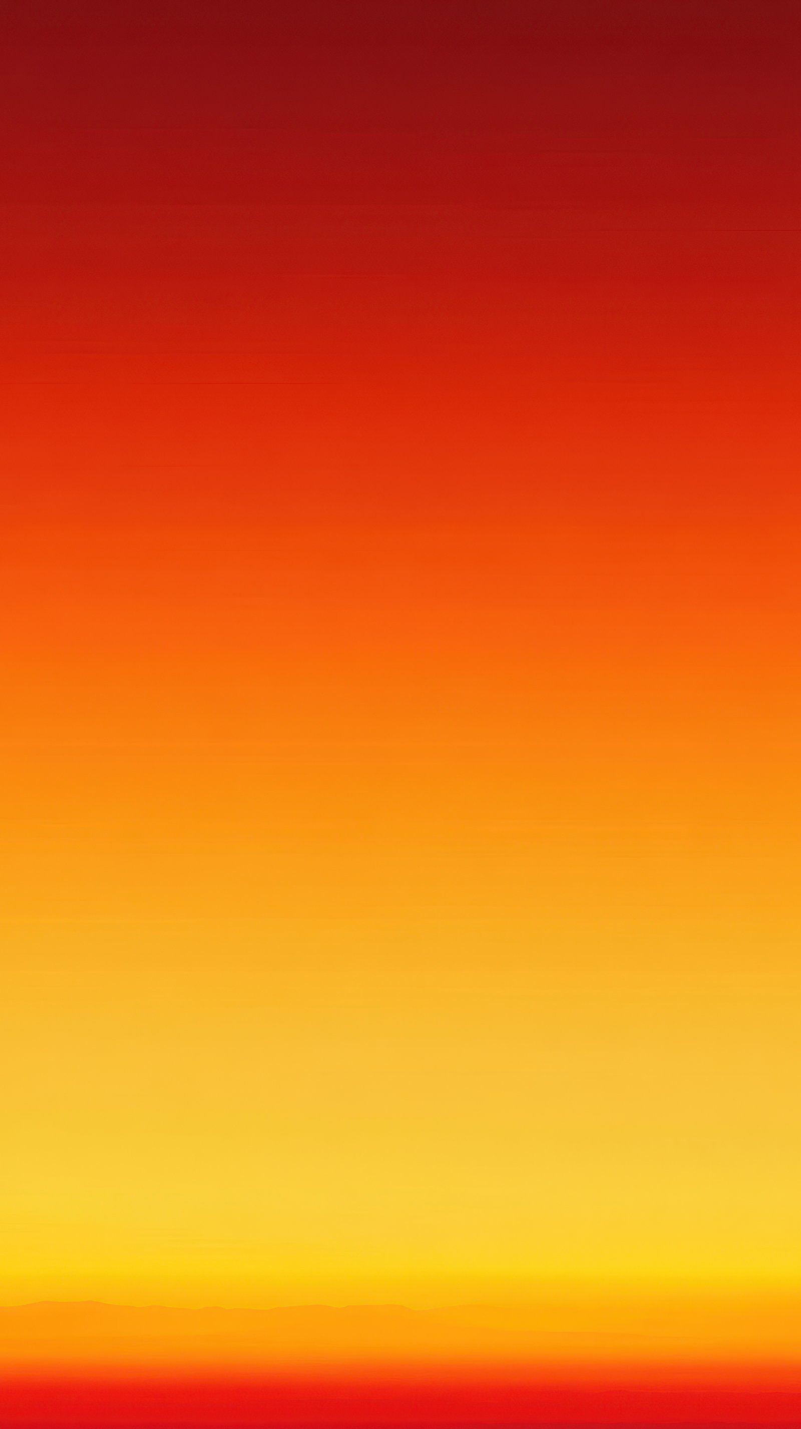 Vibrant sunset showcasing an array of warm colors over a calm horizon